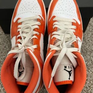 Air Jordan 1 MID SE, DM3531 800, size 9.5
Orange and White High-Top Sneakers